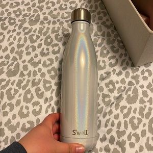 trying to downsize. iridescent in color it’s really pretty in the sun